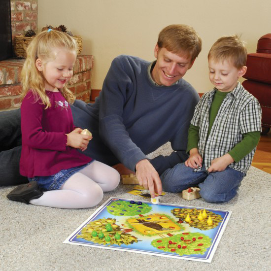 Man and children playing a game