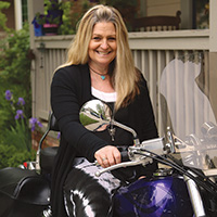 Dorothy Harman on her Motorcycle